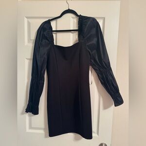 a Loves a mini long sleeve black dress